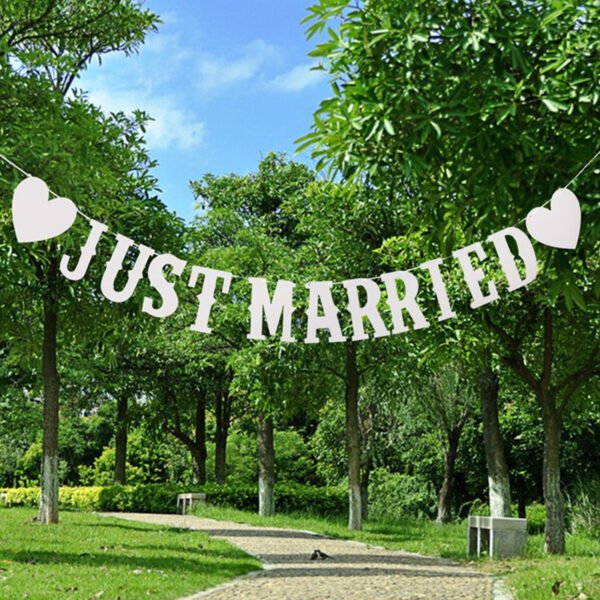 white "Just Married" Pull Flags fluttering in the breeze | Petra Shops